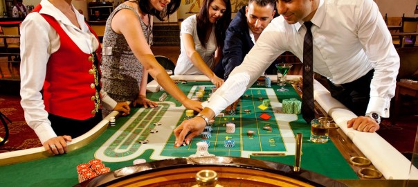 Casino players enjoying a game of roulette provided by Seattle Casino Party.