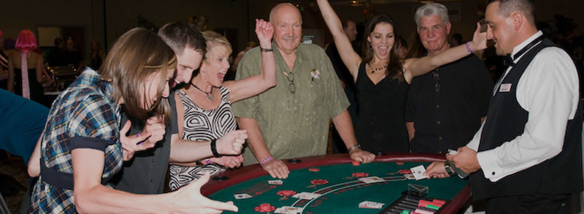Our satisfied clients enjoying their Seattle Casino Party experience!